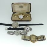 A 1920's continental silver cased lady's Wristwatch, the circular case with silvered dial, gilt