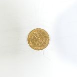 A George V gold Half Sovereign, dated 1911, in a nickel sovereign case.