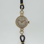 A 9ct gold Tudor lady?s Wristwatch, the circular case with silvered dial, raised gilt Arabic