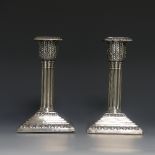 A pair of Victorian silver Corinthian column Candlesticks, by Edward Hutton, hallmarked London,