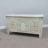 A painted antique oak Coffer, of rectangular form, with carved panelled front and hinged lid, W