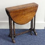 A Victorian walnut 'bobbin' Sutherland Table, the oval top raised on bobbin turned supports with