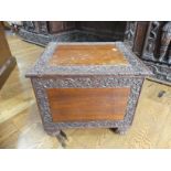 An early 20thC mahogany Coal Bucket, with moulded decoration, the lid enclosing lead lined interior,