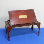 A 19thC mahogany military campaign style Folding Desk, of rectangular form, the hinged top with