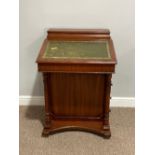 A reproduction mahogany Davenport, with touled leatherette inset, above four drawers and turned