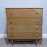 A retro Chest of Drawers, comprising four long drawers, varied in size, raised on tapering legs, W