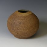 A studio pottery globular Squat Vase, in the manner of Waistel Cooper, with rough textured glaze and