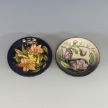A Moorcroft 'Sweetpea' pattern Pin dish, tube lined decoration on a smoky ground, with painted and