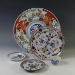 An antique Chinese export Plate, decorated in the imari palette, restored, diameter 21.5cm, together