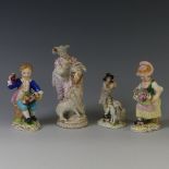 A 19thC continental porcelain figure of a Shepherd, after a Meissen figure, holding a dove and