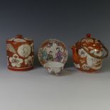 An antique Oriental porcelain Tea Bowl and Saucer, decorated with figures in interior scenes,