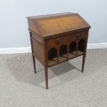 A Liberty & Co Arts and Crafts oak Writing Desk, with fitted fall-front and a single frieze drawer