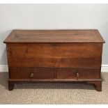 A late 18thC oak Mule Chest, with hinged lid opening to reveal a large compartment, the front with