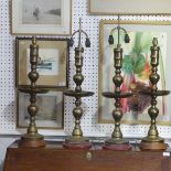 A pair of heavy Oriental turned brass Table Lamps, with bobbin turned shafts, drip trays and