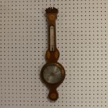 An Edwardian inlaid mahogany wheel Barometer, with inlaid rosette and shell motifs, H 59cm.