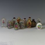 A small quantity of Oriental glass Perfume Bottles, each painted with figures, landscapes and