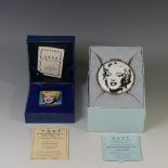 A limited edition Halcyon Days enamel Box, depicting 'Shot Blue Marilyn', 119/500, together with '