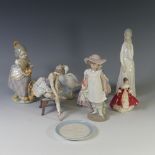 A Lladro figure of 'Ms Valencia', modelled with a basket of oranges, together with a Lladro figure