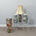 A 20thC Chinese porcelain famille rose Stick Stand, of cylindrical form, with figural panels and