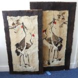 A pair of Oriental fur Bird Wall Panels, each depicting cranes in a landscape, largest W 100cm x H