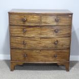 A Georgian mahogany bow-front Chest of Drawers, with two short above three long drawers, graduated
