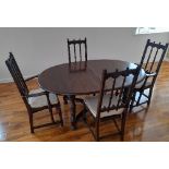 An Ercol 'Old Colonial' extending Dining Table, together with four Ercol 'Old Colonial' dining