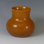 A Pilkingtons Royal Lancastrian squat Vase, in ribbed burnt orange sparkling glaze, with printed