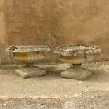 Garden Statuary; a pair of antique stoneware Garden Urns, moulded with foliate and fluted