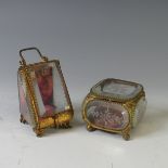 A Continental Gilt-metal Jewellery Casket, having bevelled glass panels, decorated with engraved