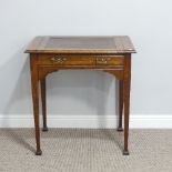 An Edwardian oak 'Stones' patent Desk, with sliding writing slope having inset leather scriber,
