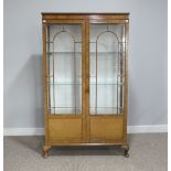 An early 20thC walnut Display Cabinet, raised on short cabriole legs and pad feet, W 94cm x D 34cm x