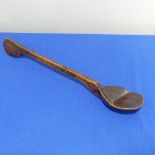 An antique Tribal carved wooden Spoon or Scoop, probably African, carved with geometric circles