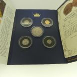 A London Mint 'Monarchs of the Twentieth Century' presentation Coin Album, containing a Victorian