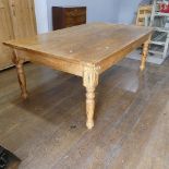 A pine farmhouse Kitchen Table, with rounded corners, on turned legs, some mouse damage to one