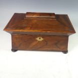 A George IV rosewood sarcophagus Tea Caddy, the hinged lid opening to reveal a fitted interior