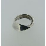 Georg Jensen; a silver Mobius Ring, design no. 148B, Size K, 4.6g.