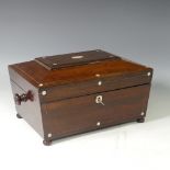 A mahogany and mother of pearl inlaid Sewing Box, of sarcophagus form, the hinged lid opening to