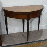 A George III mahogany inlaid demi-lune Card Table, the fold over top with green baize lining, raised