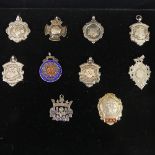 A collection of ten silver Watch / Prize Fobs, four with presentation inscriptions, the other six