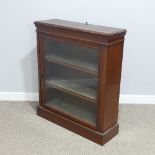 An Edwardian Bookcase Cabinet, with single glazed door opening to reveal two adjustable shelves,