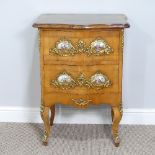 A French Louis XVI Commode, comprising two drawers, each with gilt mounts and porcelain plaques, W