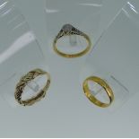 A small 22ct yellow gold band, Size G, marks worn, 2.3g, together with a 9ct two-colour gold band,