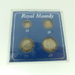 A set of Victorian Maundy Money, dated 1899, in perspex presentation case.