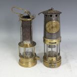A brass and steel Davy Miners safety Lamp, with suspension hook, brass plaque to upper section