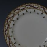 A Theodore Haviland Limoges part Dinner Service, comprising a cake stand and twenty nine plates,