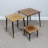 A nest of three retro wooden Tables, some splits and fading, W 43cm x D 49cm x H cm (3)