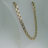 A 9ct gold gentleman's double curb link Chain, 61cm long, approx total weight 68.2g.