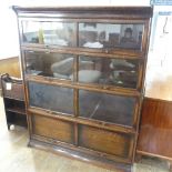 An early 20thC Globe Wernicke style oak Stacking Bookcase, with three glazed sections above a