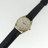 A vintage 9ct gold Rolex gentleman's Wristwatch, the champagne dial with gilt baton markers
