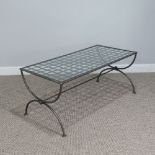 A contemporary glass and steel Coffee Table, W 107cm x D 53cm x H 46cm.